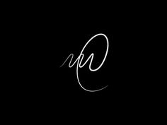 the letter n is written in white ink on a black background