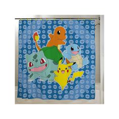 a shower curtain with pokemon characters on it