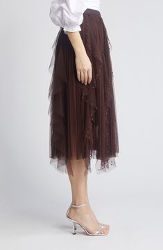 Charm from day to night in this beaded skirt crafted with layers of luscious tulle. Lined 90% polyester, 10% spandex Hand wash, dry flat Made in the USA Beaded Skirt, Brown Fits, Beaded Tulle, Fabric Gift Bags, Day To Night, Lund, Fabric Gifts, To Night, Free Fabric