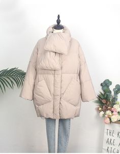 The coat model, which has a fluffy design, has a very stylish and strong structure. The inner part of the coat and parka models, in which polyester is used in the production of the outer structure, is filled with white duck down. Designed by 4COLORDRESS Magical Dress, White Duck, White Ducks, Parka Coat, Duck Down, Cotton Pads, Jeans Style, Scarf Wrap, Parka