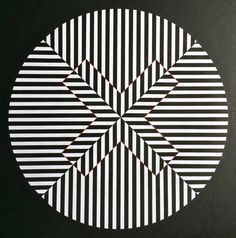 a black and white circle with lines on it