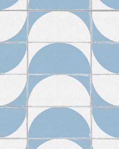 a blue and white tile pattern with circles