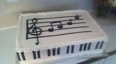 a sheet cake with musical notes on it