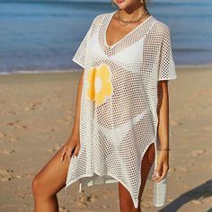 Women Casual Bikini Swimsuit Cover-Up Blouses Beach Tunic Dress One Size K529 Acrylic + cotton blend Imported Hand Wash Only The fabric has some stretch Feature: long sleeve, hollow out, crochet cover up, cover ups for swimwear women Regular fit, swim cover-ups for women, crochet cover-ups for swimwear women, swimsuit cover-up Occasions: suitable for swimwear, beach, swimming pool, summer party, and vacation Please refer to the last image for the size chart (The size chart is clothes size, NOT h Tropical One-piece Swimwear For Beach Cover-up, Beachy White V-neck Cover-up, Bohemian White V-neck Swimwear, Summer V-neck Swimming Cover-up, Stretch V-neck Beach Dress For Vacation, Summer Stretch V-neck Swim Dress, Beachy Short Sleeve Poolside Cover-up, Beach Season Triangle Top Cover-up, Fitted V-neck Swimwear For Beach Cover-up