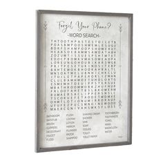 a framed word search is shown on the wall