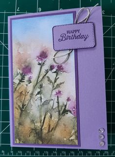 a close up of a card with flowers on it