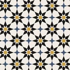 a black and white geometric pattern with yellow stars on it's center, in the middle