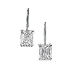 A pair of drop earrings containing 10.01 carats of GIA certified emerald cut diamonds, set in platinum. Emerald Cut Diamond Earrings, Ear Piercings Industrial, Diamonds Direct, Preppy Clothes, Emerald Cut Diamond, Diamond Drop Earrings, Diamond Drops, Emerald Cut Diamonds, Emerald Diamond