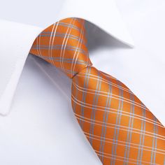 Treat yourself with a new pattern and splash of color to your look with this unique tie set. 100% Silk Handmade Package Includes: Tie, Pocket Square, Cufflinks & Flower lapel. Length: 59" Width: 3.34" Warm iron if needed We offer FREE International Shipping World Wide! Elegant Orange Suit And Tie Accessories For Formal Occasions, Orange Formal Suit And Tie Accessories, Elegant Orange Tie For Business, Classic Orange Ties For Business, Orange Standard Tie For Business, Classic Orange Tie For Business, Orange Standard Business Tie, Orange Business Tie, Kids Ties