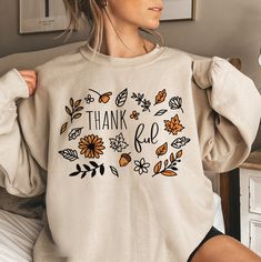 "Cottagecore Fall Sweatshirt, Vintage Thanksgiving Sweatshirt, Pumpkin Shirt, Autumn Crewneck Shop with Confidence! We are a 5-Star Rated Shop operating since 2015! HOW TO ORDER MULTIPLES: 1. Select your size and color in the drop down menus. 2. Click Add to Cart, then go back and repeat for each shirt. SIZING: * All sweatshirts are unisex, classic fit. Please refer to size chart in listing photos for details. * Easy measuring tip: Take your favorite shirt, lay it on a flat surface and measure t Fall Sweatshirt Ideas, Thanksgiving Crewneck, Autumn Sweatshirts, Positive Shirts, Fall Shirts For Women, Fall Crewneck Sweatshirt, Cottagecore Fall, Momma Shirts, Thanksgiving Sweater