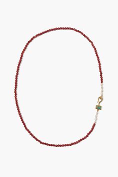 A necklace that proves bold is beautiful. A stunningly bright strand of faceted red carnelian beads is tied together with freshwater rice pearls and an 18k gold plated sterling hook with a Mexican turquoise pendant. Add to any look for an effortless pop of color.18k gold plated sterling silver.17" in length.Handmade in Vietnam. Red Bead Necklace, Nepal Jewelry, Bright Necklace, Rice Pearls, Red Beaded Necklaces, Red Carnelian, Carnelian Jewelry, Carnelian Beads, Handmade Box