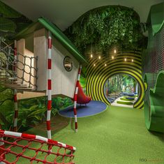 the inside of a children's play area with climbing equipment