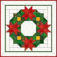 a quilted christmas wreath with red, green and yellow squares on it's center