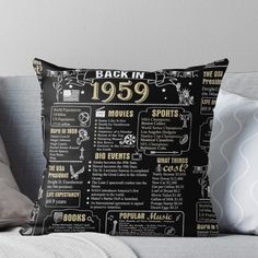 a black and gold throw pillow with the back in 1950 written on it