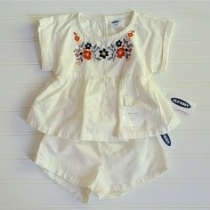 Nwt Old Navy Embroidered Floral 2-Piece Set, Size 3-6 Months, Cream With Floral Embroidery, Short-Sleeve Top And Shorts With Bow. Summer Cotton Sets With Floral Embroidery, Floral Embroidered Cotton Summer Sets, Floral Embroidery Cotton Set For Summer, Summer Floral Embroidery Cotton Sets, Summer Cotton Sets With Embroidered Hem, Spring Cotton Sets With Embroidered Hem, Cute Embroidered Cotton Sets, Casual Cotton Sets With Floral Embroidery, Embroidered Cotton Sets For Spring