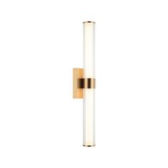 a wall light that is gold and has a glass tube attached to the back of it