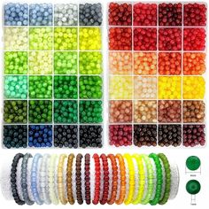 various colors of beads are arranged in rows and on the bottom row is a green button