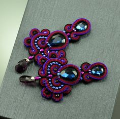 Long burgundy navy purple earrings, statement soutache earrings, long dangle sparkling earrings, vavy blue purple big earrings with crystal   FAST SHIPPING - order is delivered to you by COURIER SHIPMENT  (phone number required)!  It is sure that those earrings will be noticed by everyone. They will give style to each of your stylizations. Thanks to them, you will stand out and shine at every party. They are stand out when you will put on a simple dress or a white shirt. Ideally suited for parties, weddings, engagement, as well as gifts for the birthday, women's holidays, mother's day. ITEM DETAILS: *MATERIALS: navy glass crystal in the center, purple crystal, Soutache cords, Fire Polish, Toho beads, purple leather *COLORS: black, burgundy, purple (Soutache cords) *SIZE: 1.97 inch wide x 3 Pink Fish, Smart Jewelry, Toho Beads, Soutache Earrings, Bar Stud Earrings, Navy Purple, Earrings Purple, Bar Studs, Soutache Jewelry