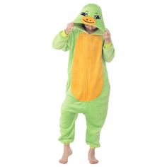 a person in a green frog costume standing up with his hands on his hips and wearing a