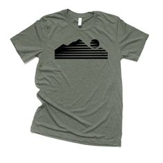 Retro Mountain shirt. Great shirt for any outdoor enthusiast.   BUY 4 GET ONE FOR FREE  Please write which shirt, size and color you would like in the notes section at checkout.  Message us if you have any questions.  This T-shirt is a soft fabric that will quickly become your favorite.  It's lightweight and flexible material is perfect for casual wear, hiking, camping, hunting, or any activity.  This T-shirt is a unisex t-shirt, so it is perfect for both men and women.  It is a Bella and Canvas Brand, soft style Tee.   Other sizes and colors can be available for special order.  Message us and we can discuss the options. All orders are made when ordered so it will take a a few days to get it made and shipped.  Our shipping time is set at 3-8 business days.  Every once in a while we will be Gray Crew Neck T-shirt For Outdoor Activities, Gray Short Sleeve Top For Outdoor Activities, Gray Summer Outdoor Top, Gray Graphic Print Top For Outdoor Activities, Outdoor Cotton T-shirt With Graphic Design, Summer Hiking T-shirt With Screen Print, Cotton Graphic Design T-shirt For Outdoor, Summer Shirt With Screen Print For Outdoor Activities, Tri-blend Screen Print Tops For Outdoor Activities