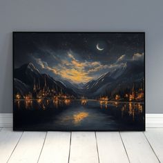 a painting on the wall of a room with a view of mountains and lake at night