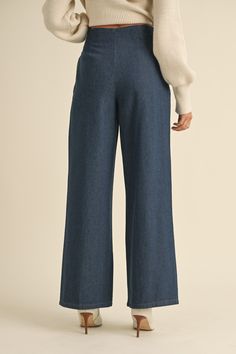 Discover effortless style with our new high-waist denim wide-leg pants. Featuring front pleats and button detailing, these pants offer a flattering silhouette and timeless appeal. Perfect for elevating your everyday look with a touch of classic sophistication. Button/zip front closure Pleated waist Straight legs Minimal stretch Size Length Waist Hip Inseam Rise Small 41" 27" 42" 30" 12.5" Medium 42" 29" 44" 31" 13" Large 43" 31" 46" 32" 13.5" White Maxi, Denim Trousers, Romper Pants, Wide Leg Denim, High Waisted Denim, Denim Shop, Everyday Look, Effortless Style, Leg Pants