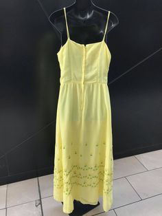 "1970s \"Vicky Vaughn Junior\" Sunshine Yellow Cotton Maxi Dress with Floral Embroidery. Taffeta lining. Original \"Talon\" metal zipper down back. Measurements: Bust: 38\" Waist: 28\" Hips: 37\" Length: 56\" Condition: Excellent, vintage condition." Retro Embroidered Summer Dress, Summer Retro Embroidered Dress, Vintage Spring Dress With Spaghetti Straps, Vintage Spring Dresses With Spaghetti Straps, Vintage Dresses With Spaghetti Straps For Spring, Vintage Spaghetti Strap Dresses For Spring, Vintage Spaghetti Strap Vacation Dress, Vintage Spaghetti Strap Dress For Vacation, Blue Tulle Prom Dress