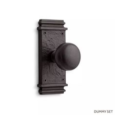 an iron door handle with a round knob on the front and side of it, against a white background