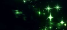 green stars are shining in the dark sky