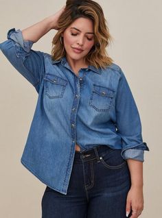 Versatile, comfortable and a closet staple, a medium wash denim shirt has a refined fit that's designed to flatter. Medium-wash denim. Spread collar. Front button closure. Button-flap chest pockets. Shirttail hem. CONTENT + CARE Cotton. Wash cold; dry low. Imported plus size tops. SIZE+ FIT Model is 5'10”, size 1. Size 2 measures 29” from shoulder. The best plus size women's taylor medium wash denim button-down shirt the in medium wash denim made of denim. You'll want to wear these basics every Dark Denim Shirt, Plus Size Denim, Maxi Skirt Dress, Cute Blouses, Denim Button Down, Shoulder Shirts, Light Denim, Plus Size Blouses, Denim Shirt