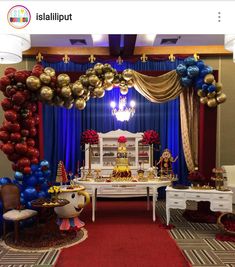 a room decorated with balloons and decorations