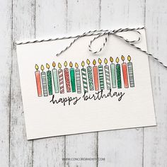 a birthday card with candles on it and the words happy birthday written in black ink