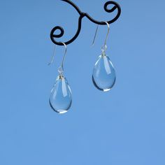 "These Small clear teardrop earrings are made of glass in lampwork technique. The earrings hooks are sterling silver and are hypoallergenic. These unique and beautiful earrings are like water drops frozen in glass! They are simple and elegant, very lightweight and comfortable to wear, perfect for everyday wear and for special occasions. 💕 You will definitely receive lots of compliments on your new earrings, everybody loves them, and you'll love them too! Dimensions: total length about 1 1/8\" i Small Drop Earrings, Water Drop Earrings, Glass Drop Earrings, Tear Drop Earrings, Lampwork Glass Beads, Water Drops, Water Drop, Earrings Dangle, Tear Drop