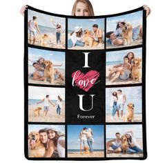 a woman holding up a blanket with pictures of people and their dogs on the beach