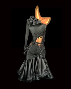 a mannequin wearing a black dress with flowers on the bust and sleeves, in front of a black background