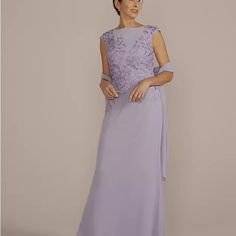 a woman in a long purple dress