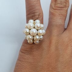 You are viewing a beautiful 14k solid gold white cultured cluster pearl ring. The ring marked 14k and ming's inside. The ring size is 4 1/2 can size up The ring itself measures approx. 21mm x 19.5mm The total weight of the ring is 7.17 grams. The ring is in good pre owned condition. White Pearl Ring, Gemstone Rings Vintage, Rings Vintage, Pearl Ring, White Pearl, Rings Statement, Pearl White, Ring Gift, Statement Rings