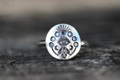 "This listing is for one sterling silver celestial ring featuring so many gorgeous deeply stamped symbols: an All Seeing Eye is surrounded by celestial moon phases and three crystal points. Wear it solo or with stacking bands for an irresistibly enchanting bohemian and fun vibe. These rings make a great gift for anyone who loves the moon, stars, and crystals. - Choose your ring size and stacking options at checkout! - Sterling silver moon and star focal measures approximately 14 mm in diameter. Moon Phase Ring, Angel Ring, Witch Rings, Crescent Moon Ring, Serpent Ring, Celestial Ring, Snake Ring Silver, Smoky Quartz Ring, All Seeing Eye