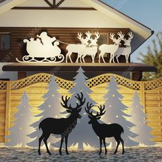 christmas scene with reindeers and sleigh in front of a wooden house at night