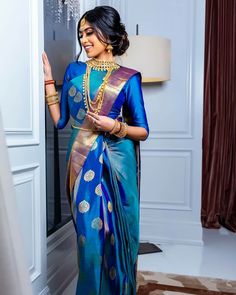 Indian Bride with indian wedding saree Latest Silk Sarees, Blue Silk Saree, Blouse Back Neck Designs, Silk Saree Blouse Designs