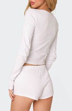 Comfy yet cool, this cropped henley is crafted with fine allover ribbing for a close fit. Button half-placket V-neck Long sleeves 95% cotton, 5% spandex Machine wash, dry flat Imported White Cropped Crop Top With Button Closure, Spring Fitted Henley With Henley Neckline, Cropped Henley, Henley Top, Nordstrom, Spandex, Size Small, V Neck, Long Sleeve