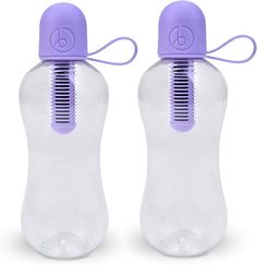 two plastic bottles with purple handles and nozzles