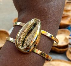 This bracelet is 100% handcrafted with brass. Listing for two bracelets  For more bracelets click the link below https://www.etsy.com/listing/929226883/african-handmade-beaded-bangles?ref=shop_home_active_19 Dhl shipping express Thank you. Handmade Brass Cuff Bracelet Bangle, Handmade Brass Cuff Bracelet Shaped As Bangle, Handmade Brass Bangle Cuff Bracelet, Handmade Brass Bangle As Gift, Handmade Bronze Brass Cuff Bracelet, Unique Handmade Bronze Bangle, Handmade Brass Bangle Gold Bracelet, Eva Marcille, Beaded Bangles