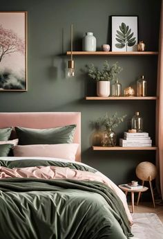 a bed with green sheets and pillows in a room that has shelves on the wall