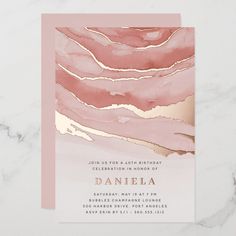 a pink and gold birthday party card with marbled paper on the front, featuring an abstract