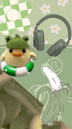 a crocheted frog with headphones and an inflatable life preserver