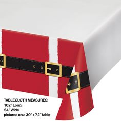 a red and white table cloth with a santa suit on it