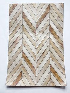 a wooden chevron pattern is shown on the wall