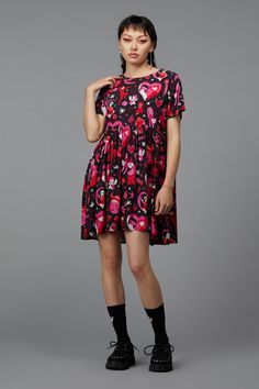 Embrace your inner diva with the Devil Dance Party Dress by Black Friday. This print dress features a round neckline and short sleeves, providing a classic silhouette that flatters all body types. The fitted style bodice accentuates the waist, while the flared skirt offers a fun and flirty vibe. The gathered waist adds volume to the skirt, enhancing the relaxed fit for ultimate comfort and style. Made from soft woven viscose, this dress is both lightweight and breathable, making it ideal for war Dance Party Dress, Kids Scrubs, Party Dress Sale, 1940s Fashion, 1960s Fashion, Halloween Fashion, Dress 16, Dance Party, The Devil