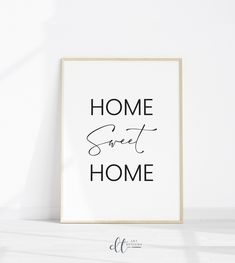 a black and white print with the words home sweet home in cursive font